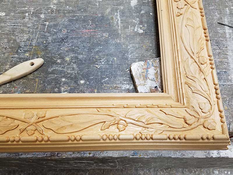 carving of the custom frame